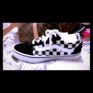 Black and white checkerboard vans
